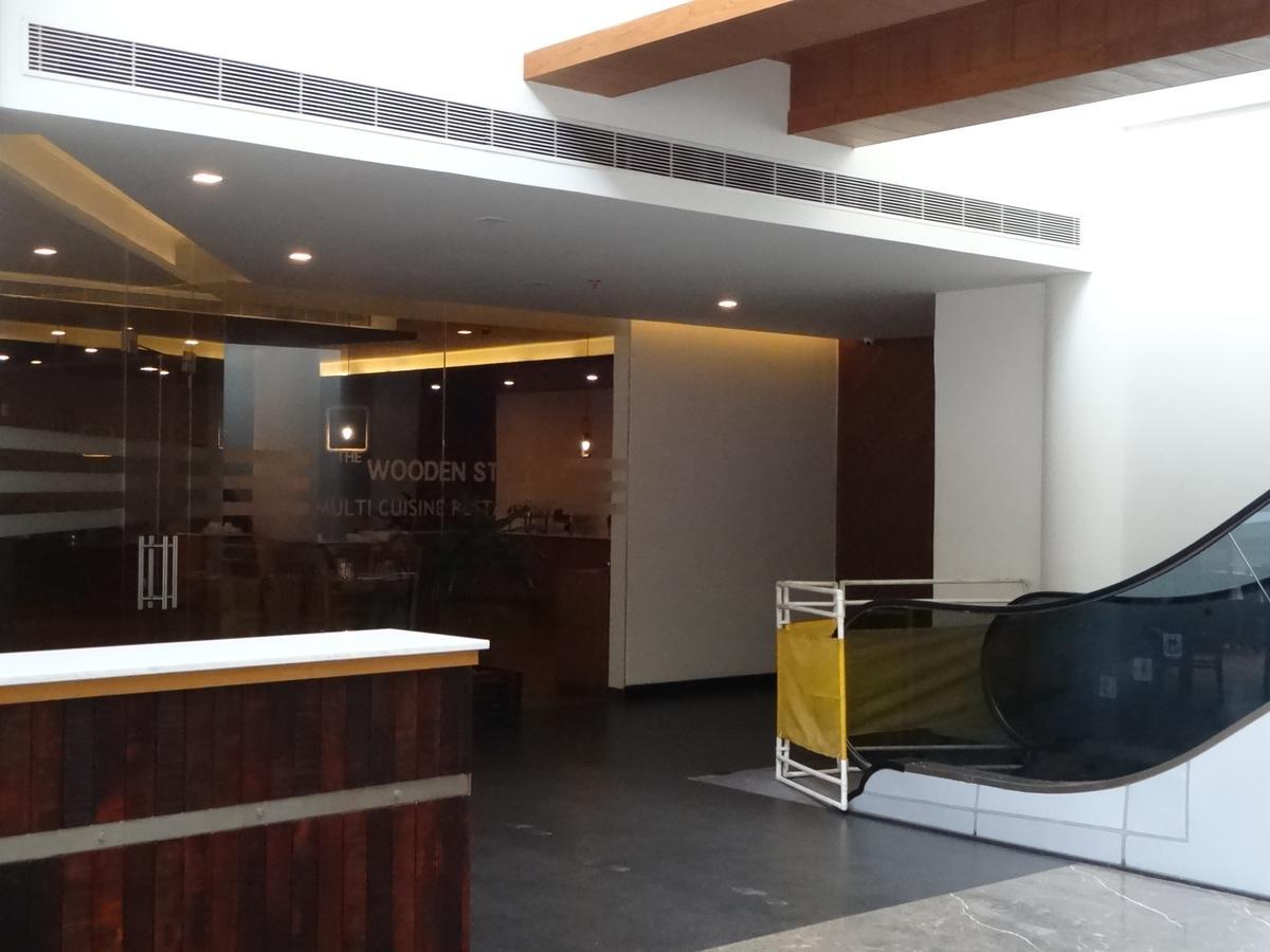Woodies Bleisure Hotel Кожикоде Экстерьер фото